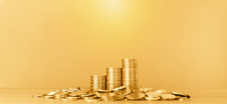 Golden coin stacks with copy space for business and finance concept idea.