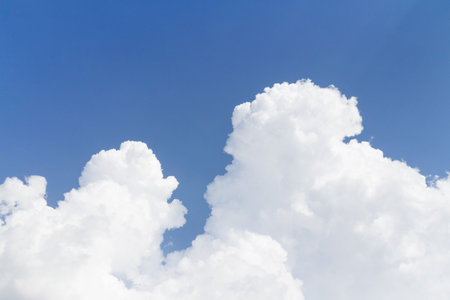 Blue sky and white cloud background with copy space for add text.の写真素材