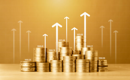 Stacks of coins with financial graph, business and finance concept idea.の写真素材