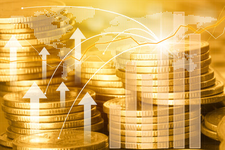Double exposure of coin stack with graph stock market and world map, business finance and investment concept idea.の写真素材
