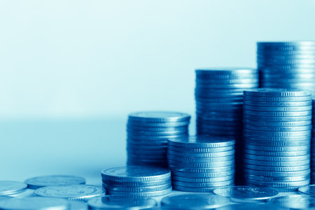 Coins stacked on each other in different positions. Money concept.の写真素材