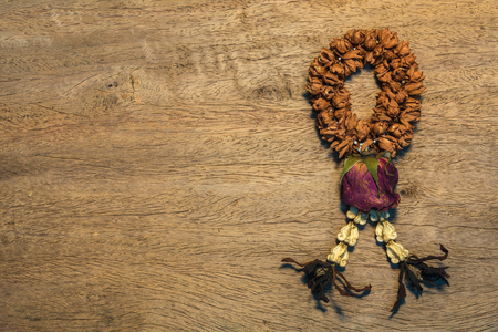 dry flower garland on wood boardの写真素材