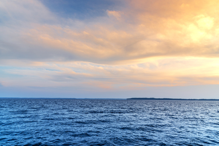 Relaxing seascape with beautiful sea and colourful sky backgroundの写真素材