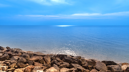 Relaxing seascape beautiful blue  sky have stone coastの写真素材