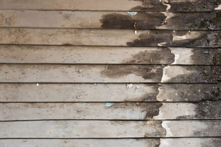 old grunge wood wall in townの写真素材