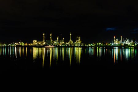 Oil refinery industrial in nighttimeの写真素材