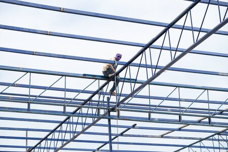 Construction worker building in daytimeの写真素材