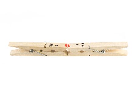 Wooden clip on white background