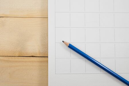 calender date and pencil on wooden backgroundの写真素材