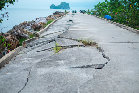 building background old road crack texture with copy space. image for transport, outdoor, construction, wreck, damage conceptの写真素材