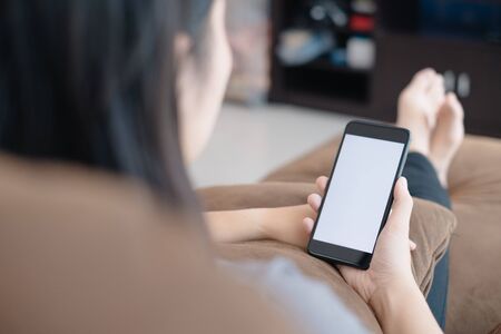 Asian women  using smartphone in stay at home comcept for protect COVID-19の写真素材