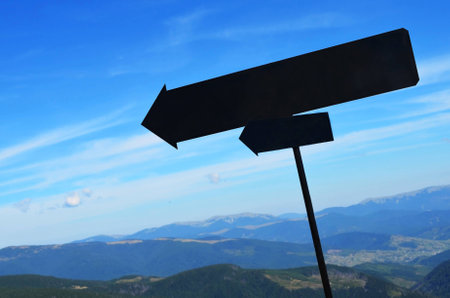 empty black arrows show the direction in mountainsの写真素材