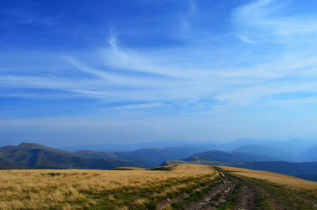 panoramic view on road on the mountain range space for textの写真素材