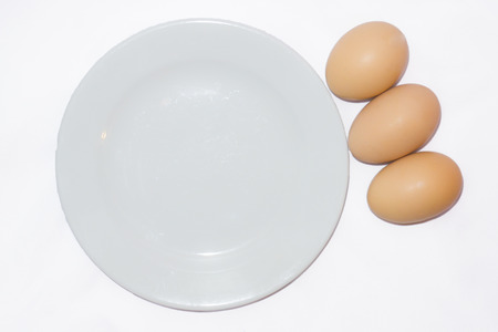 Three egg on white background.の写真素材