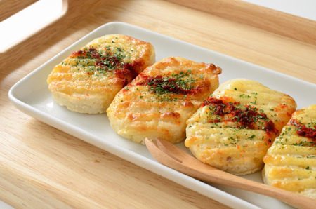 Baked potatoes with cheeseの写真素材