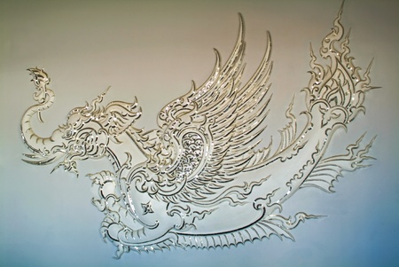 Fairy tale animal in Thai art, white church of Wat Rong Khun, Chiang Rai province, Thailandの写真素材