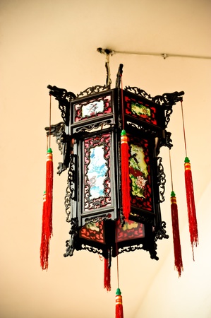 Chinese hanging lamp with decorationの写真素材