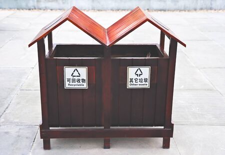 two industrial trash binsの写真素材