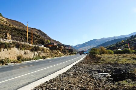 Road in the blue skyの写真素材