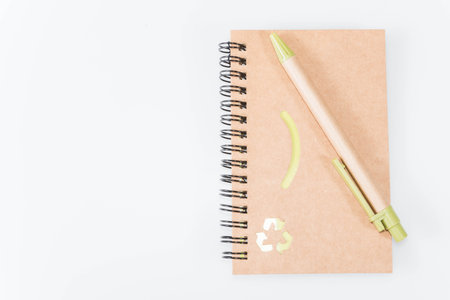 Notebook and pen isolated on white background - vintage effect style picturesの写真素材