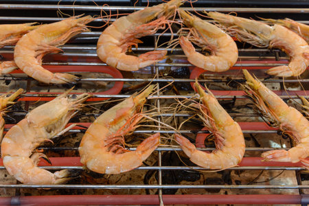 Grilled prawns on the grill in the market, Thailand.の写真素材