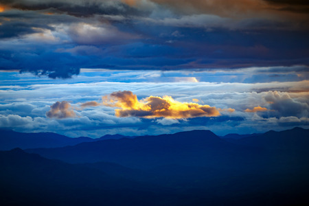 golden cloud along blue skyの写真素材