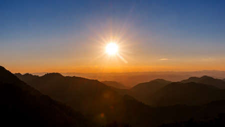 Majestic sunset sky over  blue mountains landscapeの写真素材