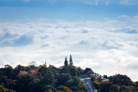 aerial view landscape of  DOI SUTHEP temple  with sea of mist in blue skyの写真素材