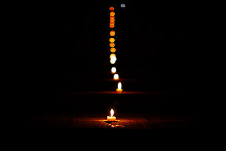 Candle cup in temple at night , Chiang Mai, Thailand