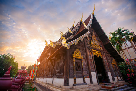 Sanctuary with golden pagoda  Wat Phan Tao temple at eveningの写真素材