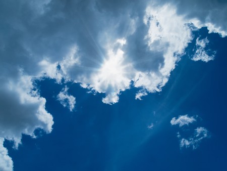 White cloud and blue sky under the sunの写真素材