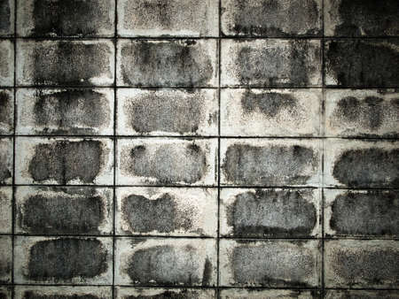 Texture of dirty brick block wall backgroundの写真素材
