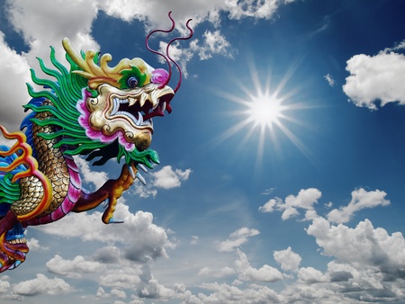 Chinese Dragon statue and sunny sky backgroundの写真素材