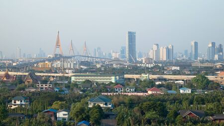 Various views of buildings and bridges across the river in Bangkok