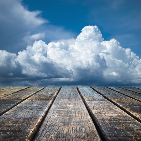 Texture of perspective Old wood floor and cloudy skyの写真素材