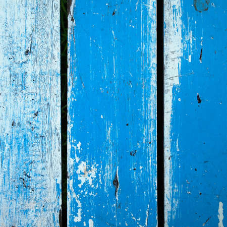 Surface of old wood Paint over with white and blue verticalの写真素材