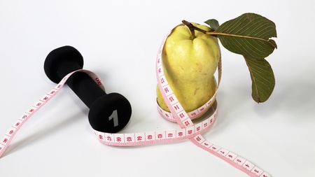 Guava fruit size tape measure and dumbbellの写真素材