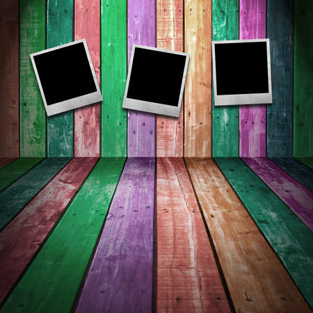 Paper photo frame on Colorful Wood Panelの写真素材