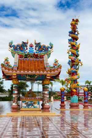 Tower and building are decorated with dragon in a Chinese templeの写真素材