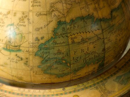 Old map on a globe The African continent