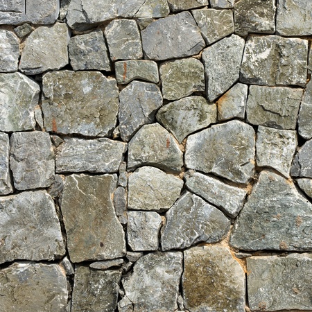 Texture of old rock wall for backgroundの写真素材