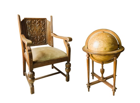 Old wooden chair and Old wooden globe on white backgroundの写真素材