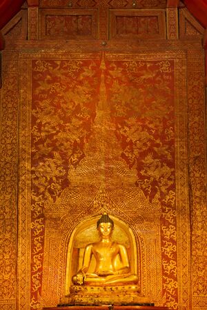 "Phra Sihing Buddha" Thai gold Buddha statues and art background of northern Thailandの写真素材