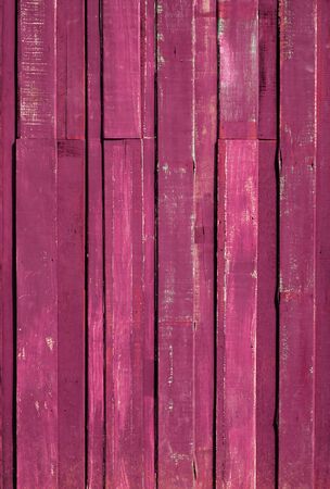 Texture of Pink color paint plank vertical wall for backgroundの写真素材