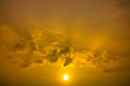 Rising Gold Sun Beam and Could Skyの写真素材
