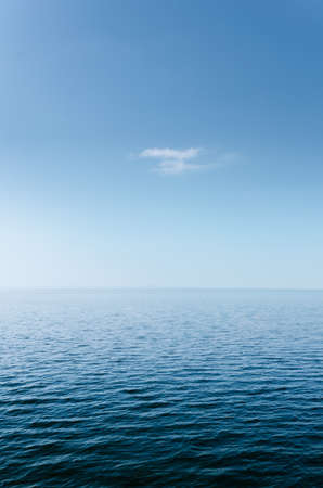 Abstract Blue Sea and Sky little White Cloud for Backgroundの写真素材
