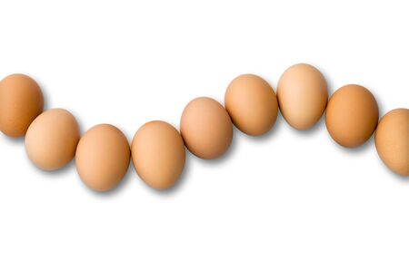 Nine Egg Arranged in Curve on White Background With Pathの写真素材