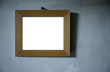 Brown Wood Photo Frame hang on Green old wall