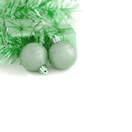 Two Green Ball with Gift Box New Year and Christmas Decoration on White Tableの写真素材