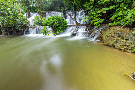 Noppiboon waterfall in Tropical Rain Forest at  Sangkhlaburi , Kanchanaburi Province, Thailandの写真素材